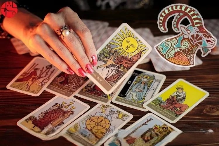 Prriya performing intuitive tarot card reading — sacred guidance session